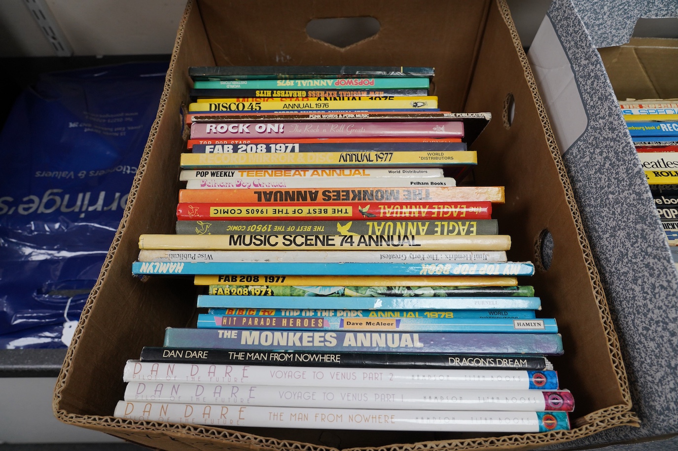 Fifty 1960s/70s Rock, Pop and Cartoon Annuals, etc. including Elvis Presley, Top of the Pops, Popswap, Radio Luxembourg, Thunderbirds, Joe 90, etc. Condition - fair